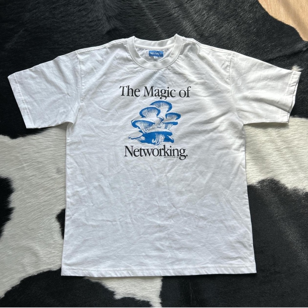 Market Studios Magic of Networking white tee with blue graphic size L